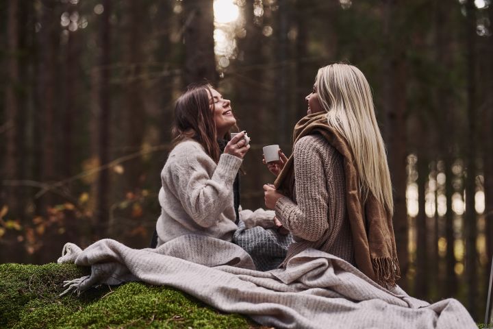 Scandinavian lifestyle things you need to try this winter - a picnic in the woods with lots of wool blankets.