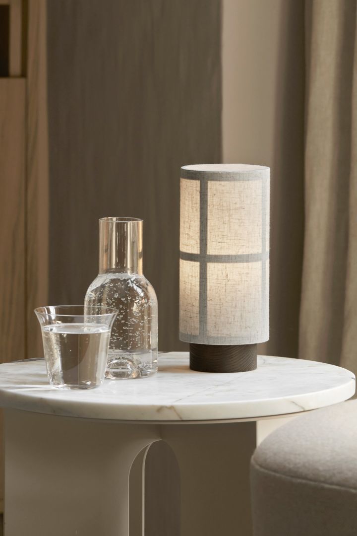 Here you see the Scandinavian design lamp Hashira on a the table. 