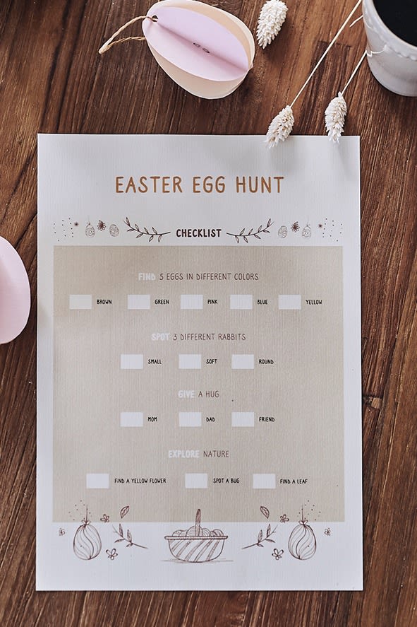 How to organise an egg hunt at Easter - create a checklist that children have to check off before they get their Easter chocolate. 