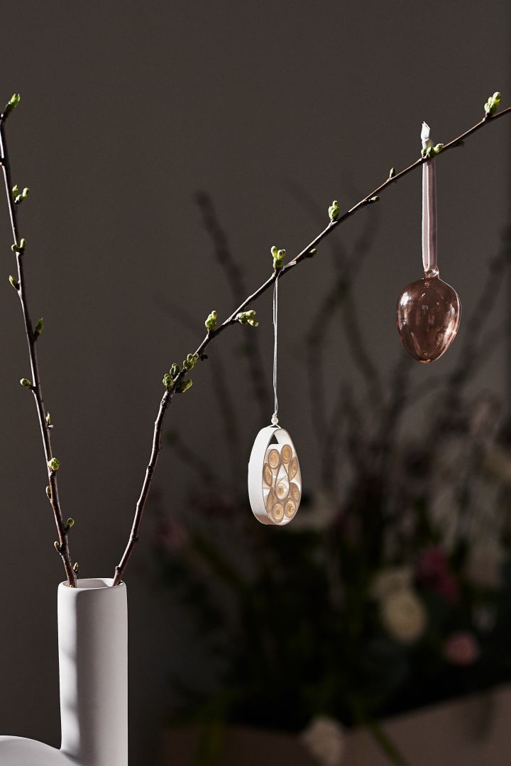 Create an Easter tree with paper decorations from DBKD and glass eggs from Iittala.