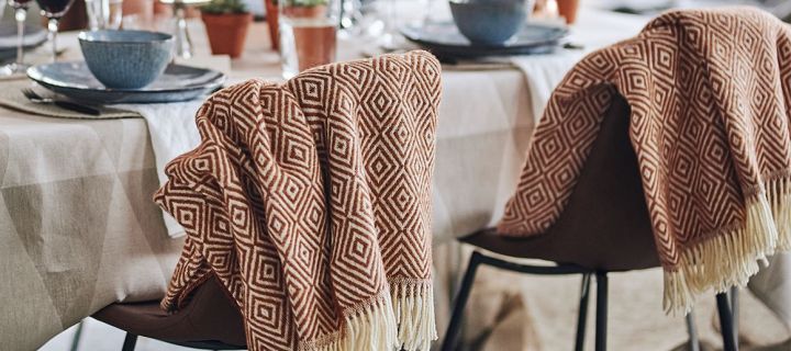 The Salt wool throw from Scandi Living is a soft throw that will help you create a cosy dining area. 