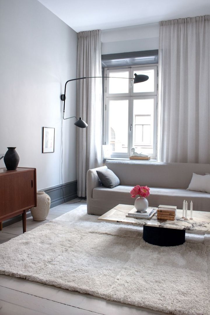 This cosy one coloured rug from layered is perfect for the living room. 