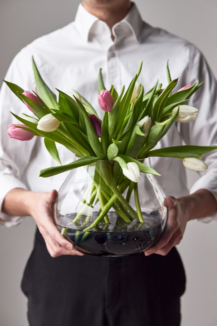 A round glass vase makes the perfect, elegant wedding gift idea, just like this smoked glass vase from Ro Collection. 