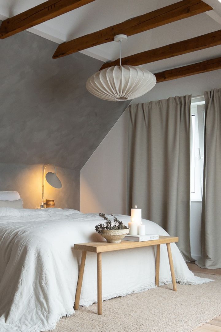 Create a Scandinavian home with @haus_tannenkamp here you see the Watt & Veke Ellipse pendant lamp hanging over a bed. 
