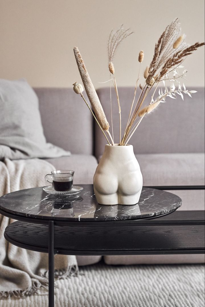 Nature vase from By On in beige with dried reeds, feels just right for a romantic interior style.