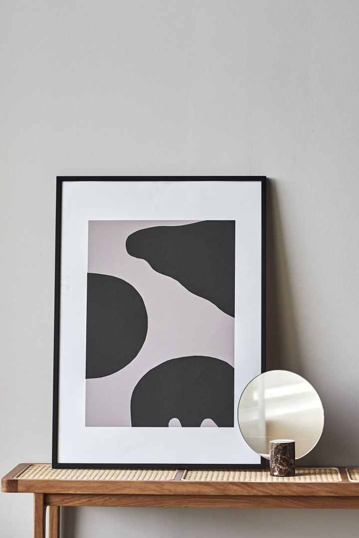 17 stylish Scandinavian wall posters to give your walls an update - here you see the abstract Contour poster from Scandi Living in tones of black and grey.
