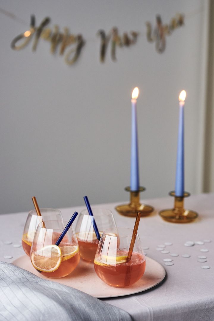 4 festive cocktail recipes for new year - Riedel O Pinot-Nebbiolo wine glass on Aida Raw serving tray with By On Boom straws.