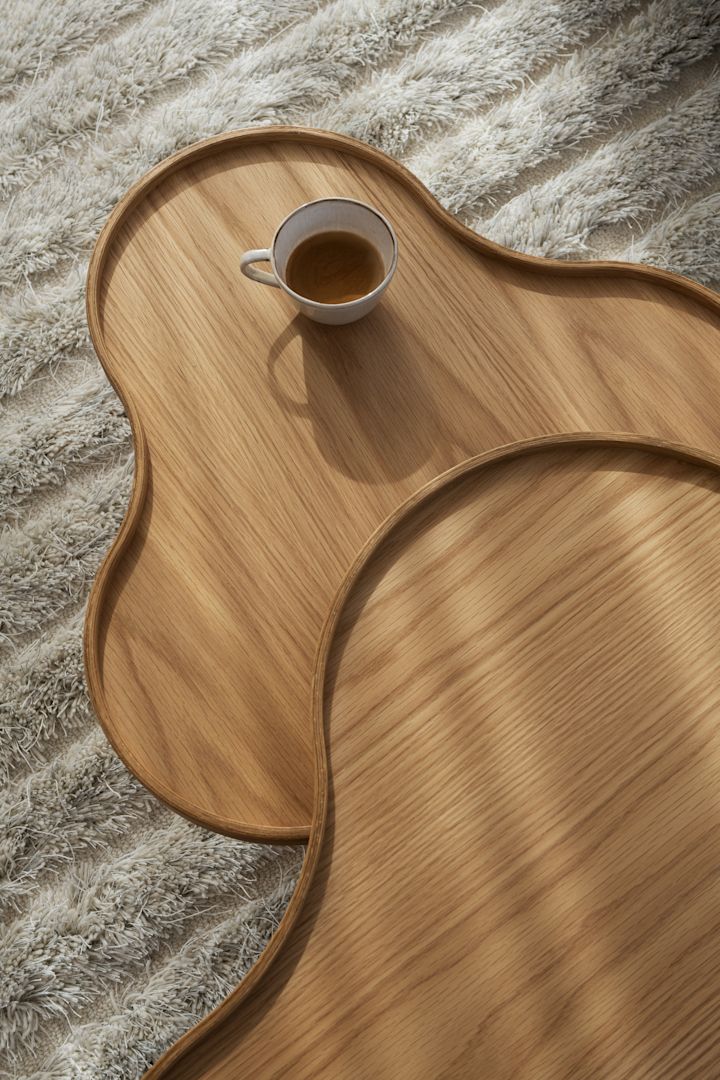 Here you see the handmade table Flower from the iconic Swedish furniture company Swedese.