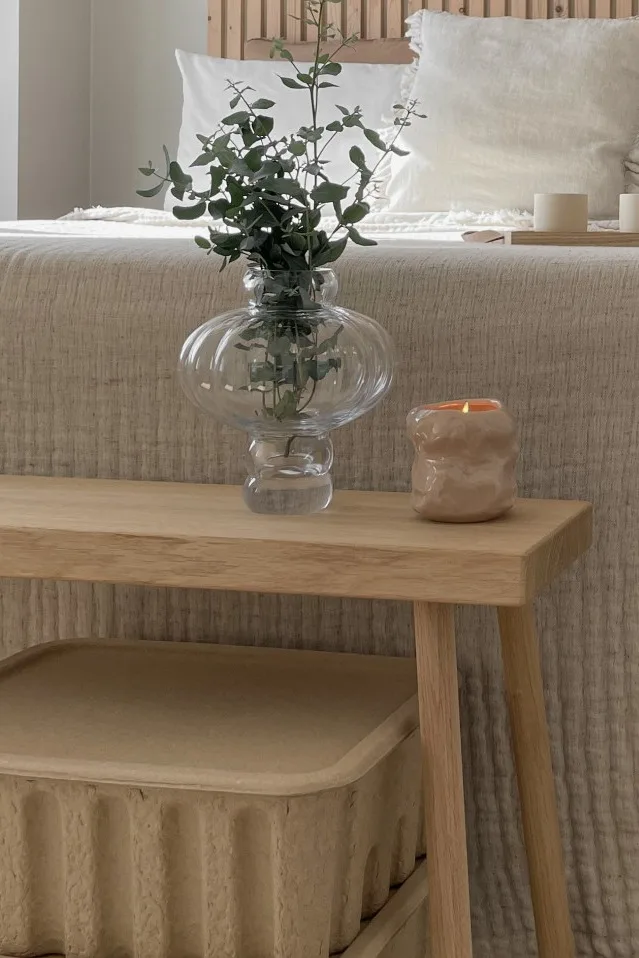 Adding fresh flowers in a gorgeous vase like the Balloon vase from Louise Roe Copenhagen is a great way to style your Scandinavian bedroom. 