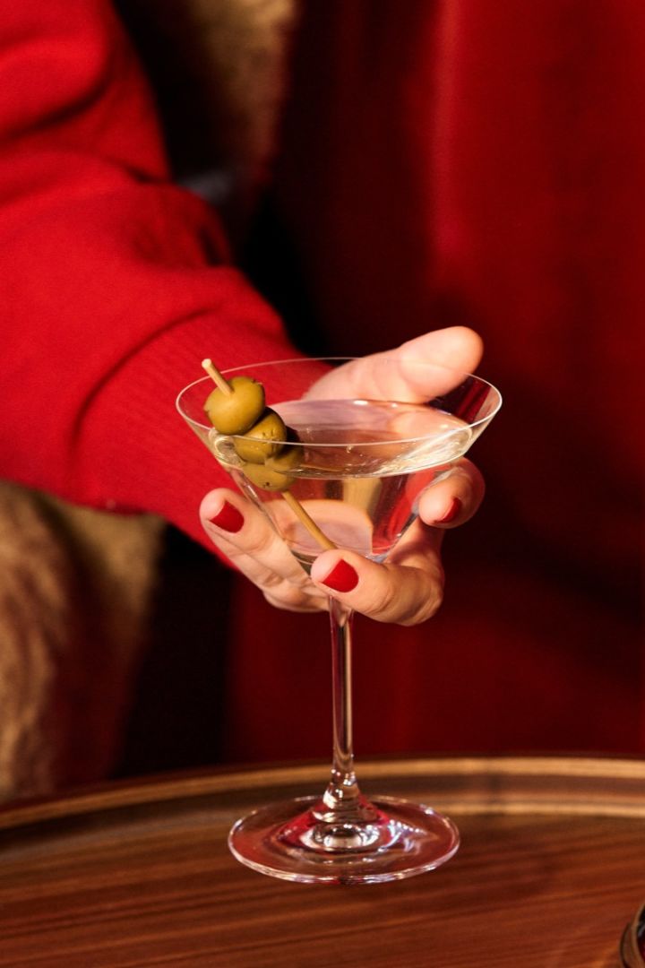 Here you see the right type of cocktail glass for a Martini and olives. 