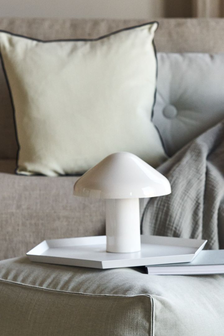 Here you see the mushroom shaped Pao portable lamp from HAY in white. 