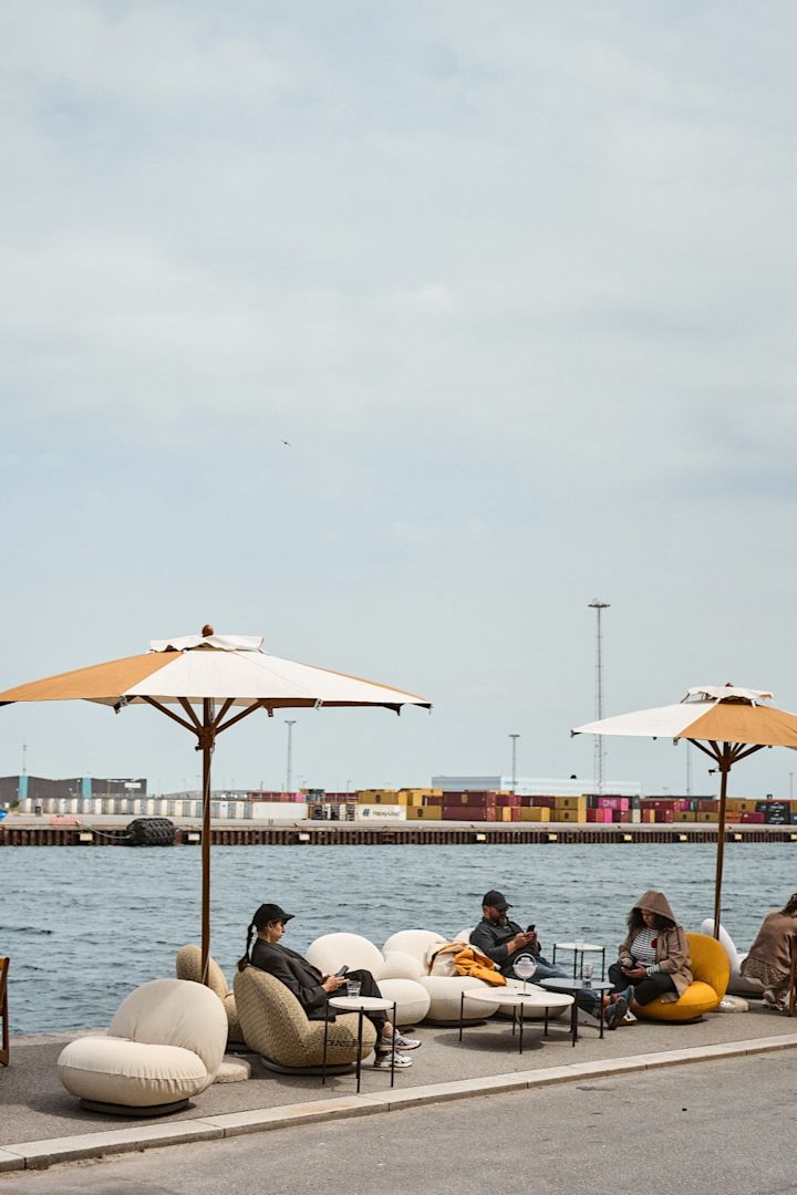 Pacha chairs from GUBI out on the dock during 3 Days of Design in Copenhagen. Be sure to add this stop on your Copenhagen city guide for design lovers. 