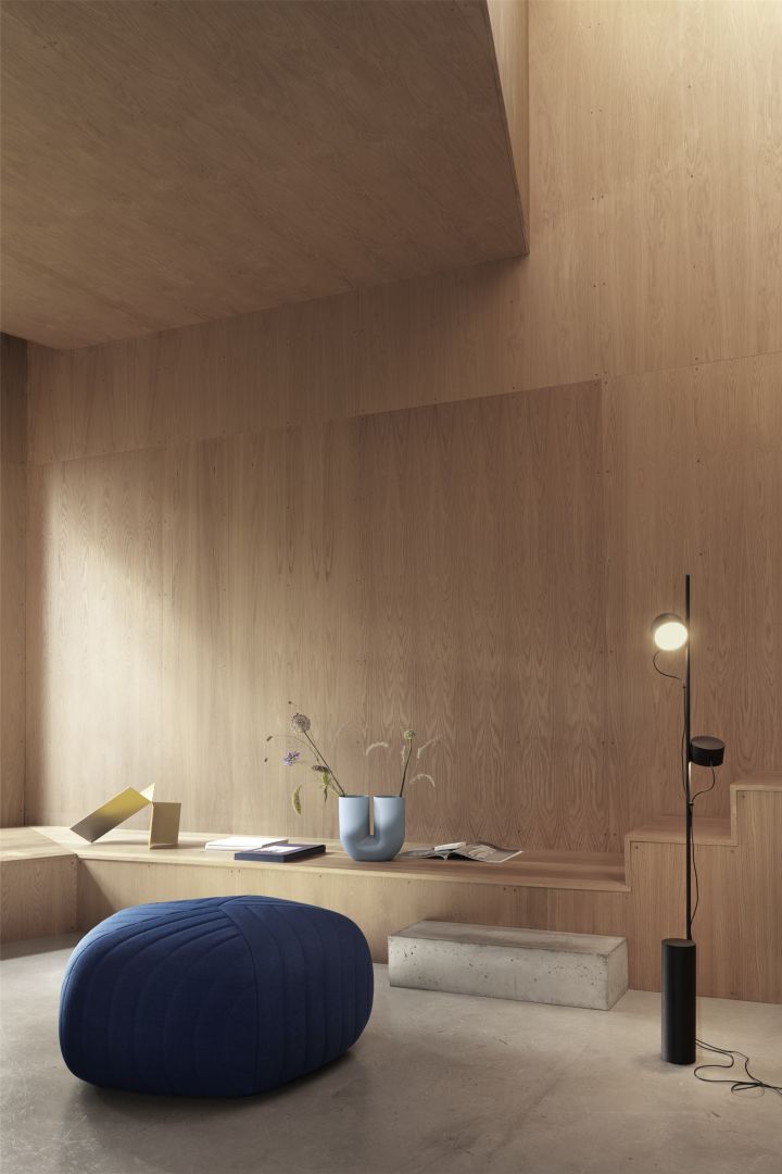 Muuto shows what is trendy in interior design in 2021 with light wood walls and blue details.