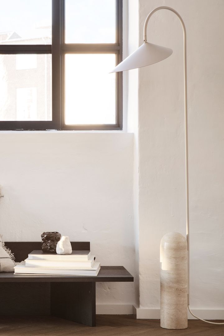 Renew your home with modern floor lamps - here you see Arum floor lamp from Ferm Living in tones of beige and marble.
