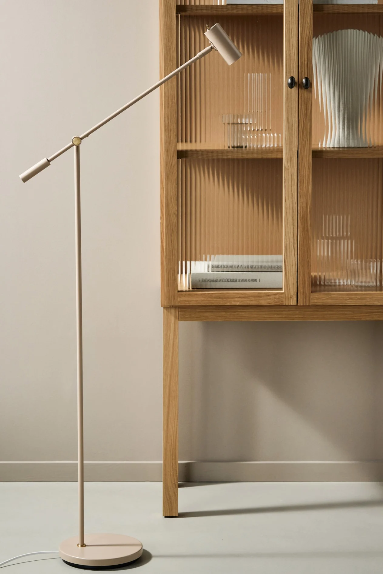 The Cato floor lamp from Belid in a dining room setting. 