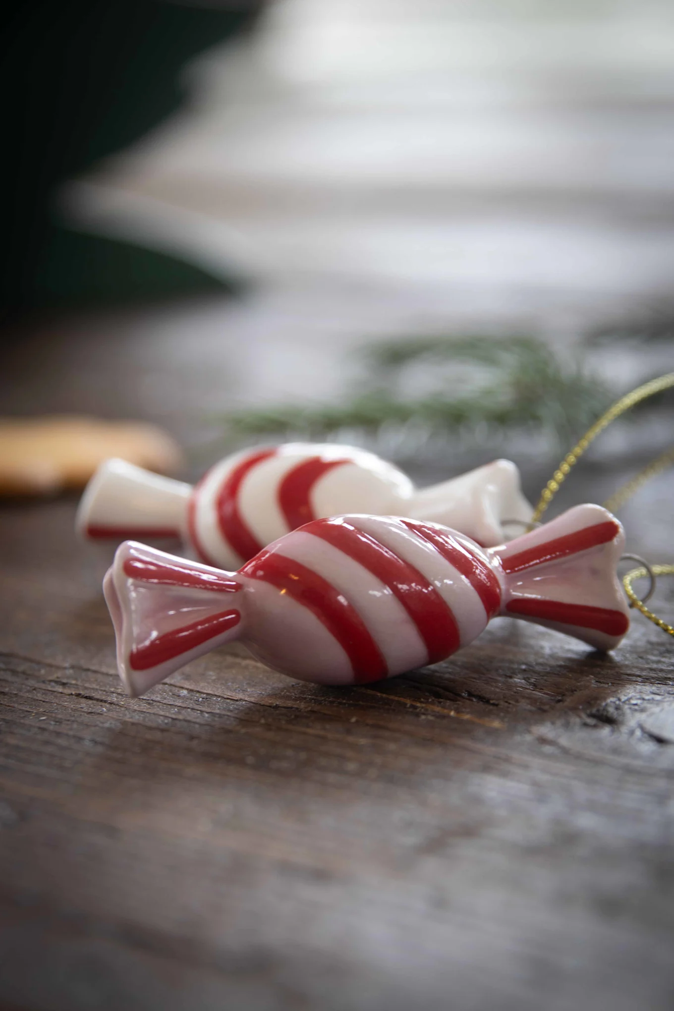 The Candy decorative pendants from Pluto Design are part of the 2025 Christmas decorations and are displayed here on a table.