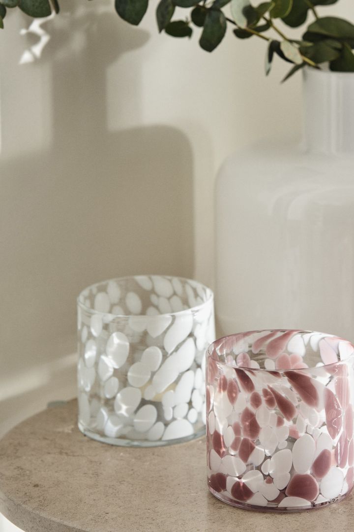 The interior design trends for spring 2023 offer the polka dot pattern trend where we like to decorate with polka dot candle lanterns from Scandi Living like these in white and pink.