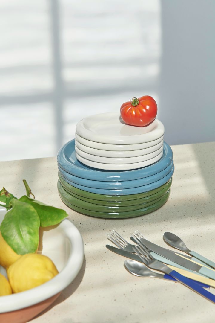 One of the major interior design trends for spring 2024 is chunky porcelain, a heavier porcelain with round, bulbous shapes - preferably with a high-gloss finish. The Barro porcelain series from HAY is a good example of chunky porcelain, with plates and platters stacked on top of each other.