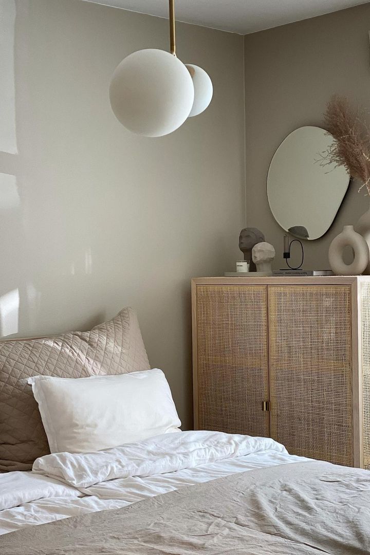 11 stylish ceiling lights to decorate your home with - here you see the Twice ceiling light from House Doctor hanging over a bed in a beige bedroom.