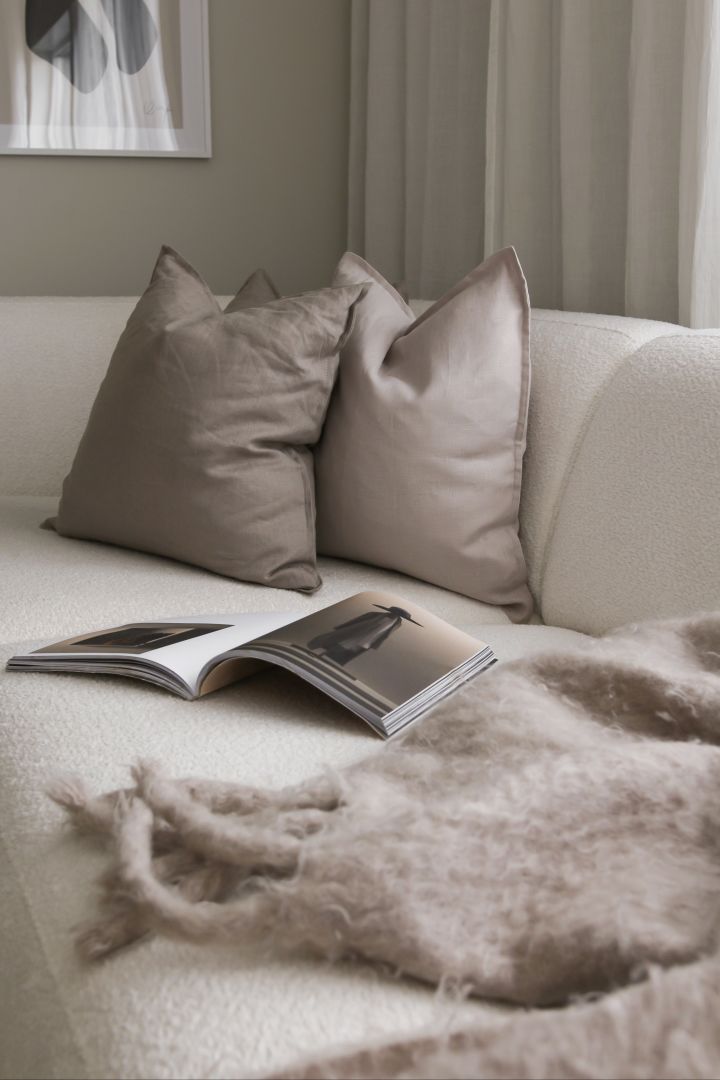 The calm pillow from Scandi Living in a neutral coloured living room, an ideal Christmas gift idea. 