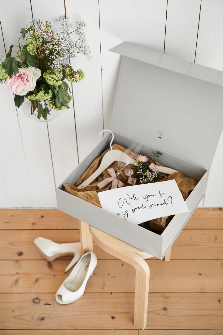 Be inspired by these unique wedding ideas like this personalised bridemaid proposal with the storage box and hanger from HAY, ideal for the bridesmaid dress. 