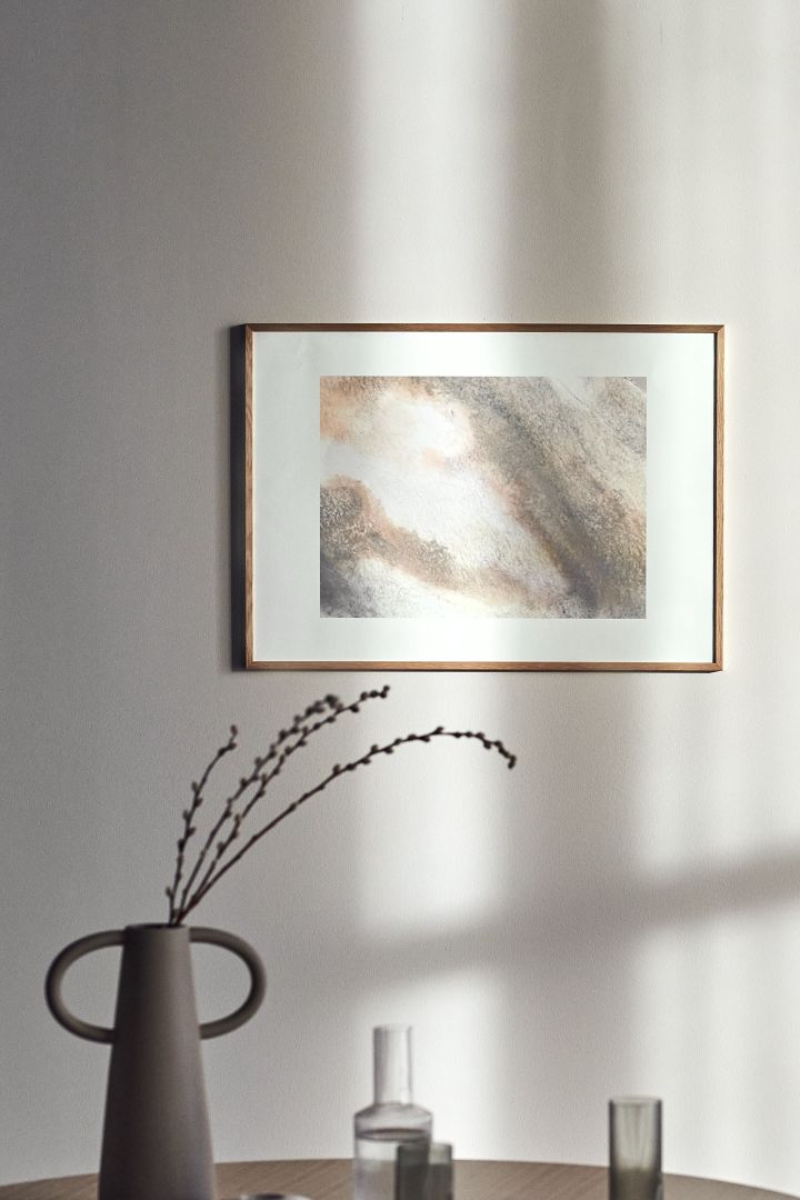 17 stylish Scandinavian wall posters to give your walls an update - here you see nature-inspired Afloat poster from Scandi Living in beige tones that resemble marble.