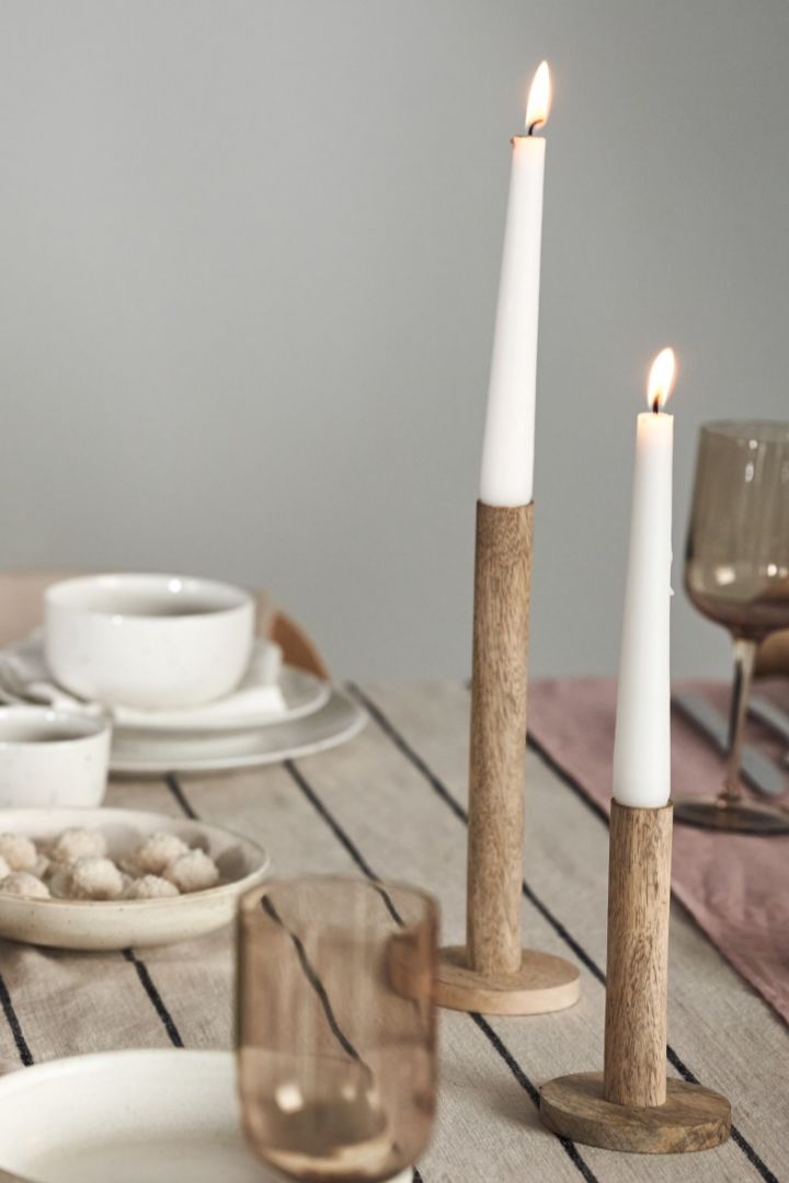 Add lots of natural materials to your Nurture Christmas tablescape like these Ernst wooden candle holders. 