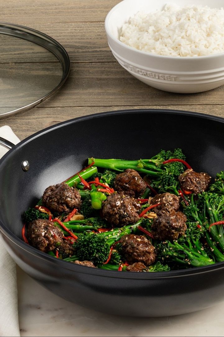 An Asian dish is prepared in the wok from Le Creuset.