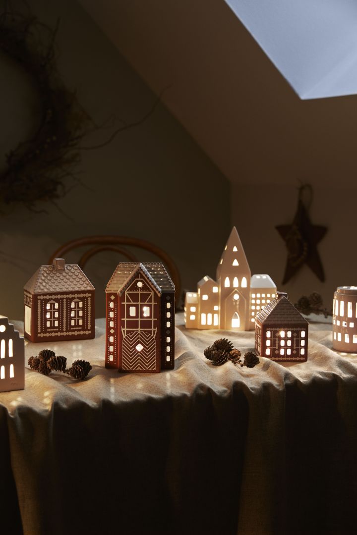 Decorate with traditional Scandinavian Christmas decorations and create a gingerbread village on the windowsill with Kähler's candle holders. 