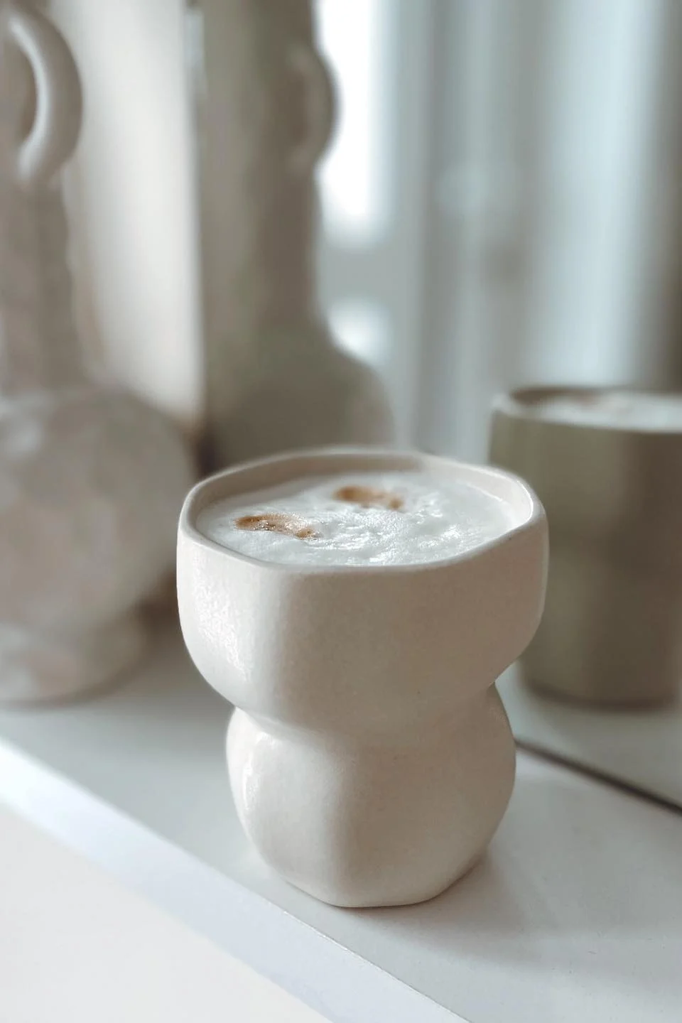 Coffee mugs: The Limfjord mug from Broste Copenhagen in beige is perfect for cappuccino or almost any other type of coffee.