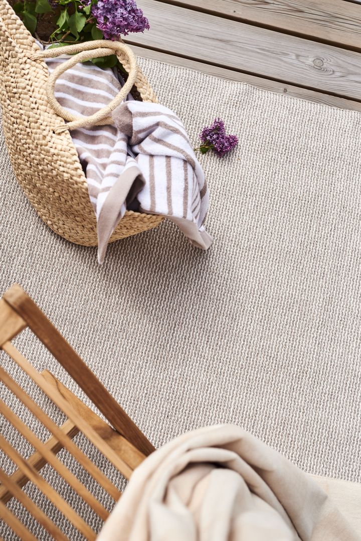 Plastic rug in nude beige from Scandi Living gives your home a clean look in our guide to choosing the right rug 
