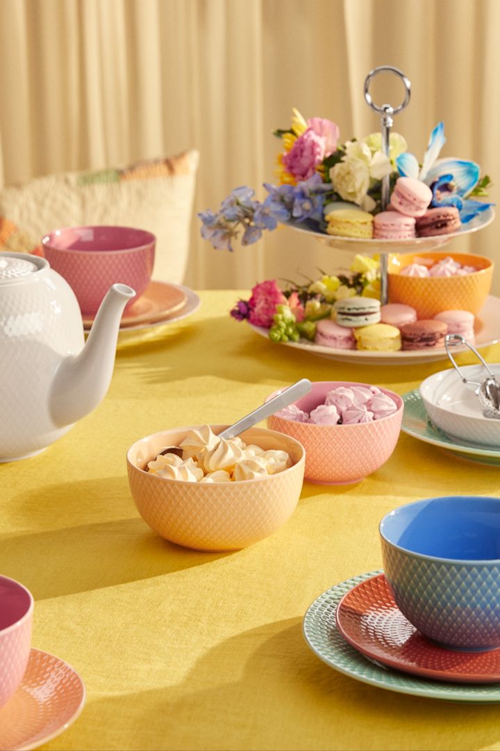 A colourful table, perfect for Easter, set with tableware from the Rhombe collection by Lyngby Porcelaen.