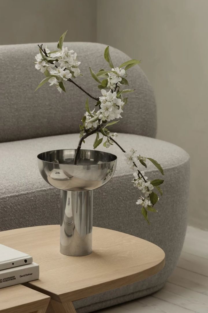 Hyactinth vase in chrome from Blomus - one of several 2024 interior design trends to be inspired by for a stylish home. 