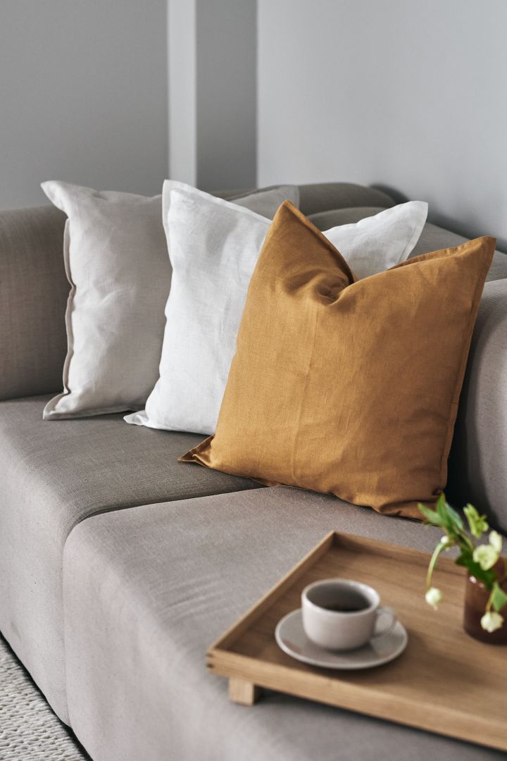 Burnt tones of mustard yellow are a big part of colour trends in 2022 - here on the pillowcase Calm from Scandi Living.