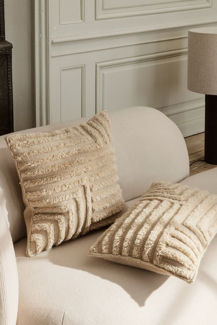 Different structures on materials is one of the spring interior design trends 2022 you can glimpse this trend in the Crease pillow from Ferm Living.