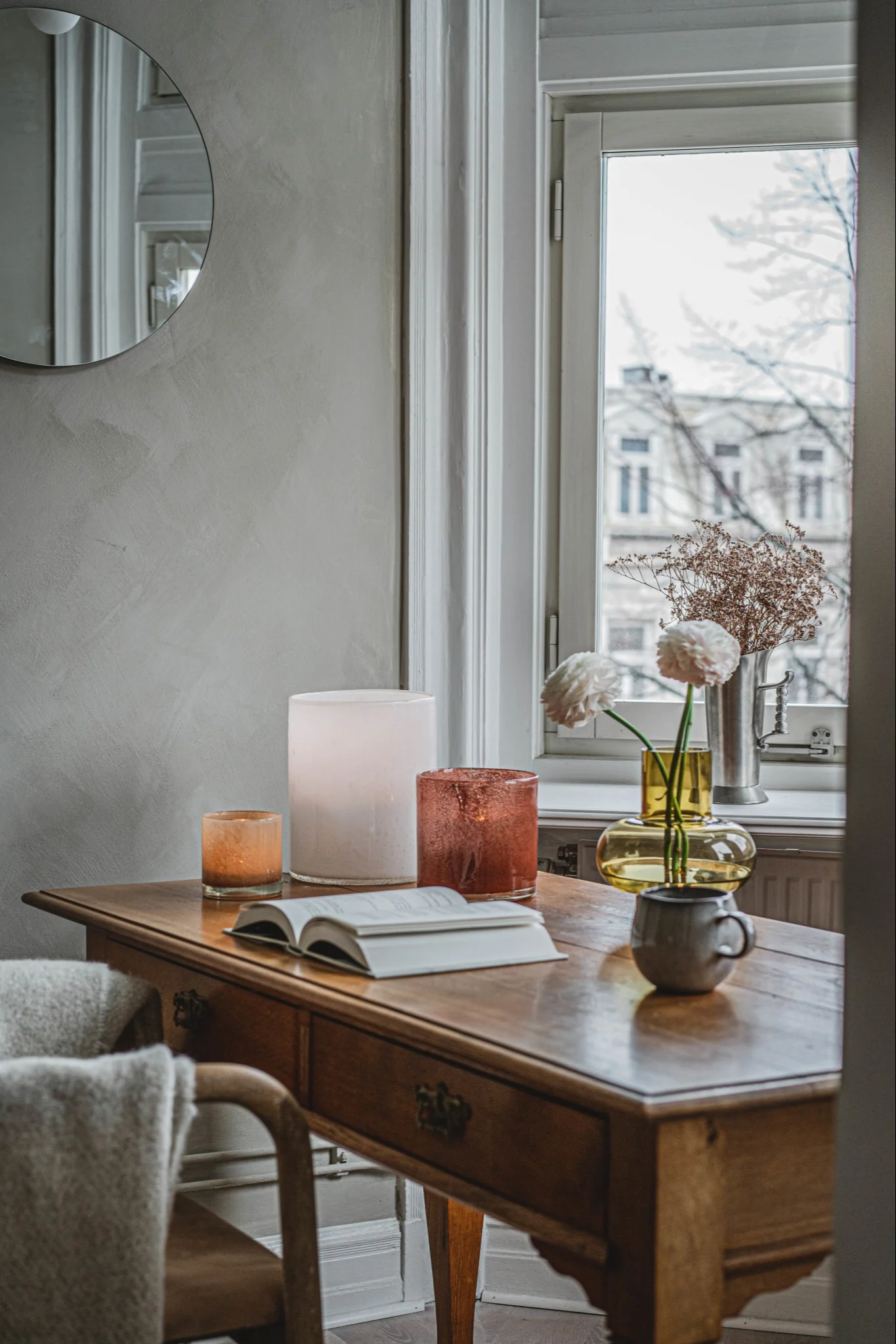 Create a cosy bedroom with personal details grouped together.