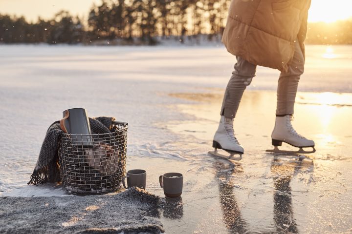Scandinavian lifestyle things for you to try this winter - Ice skating on a lake with a thermos from Stelton filled with hot coffee. 