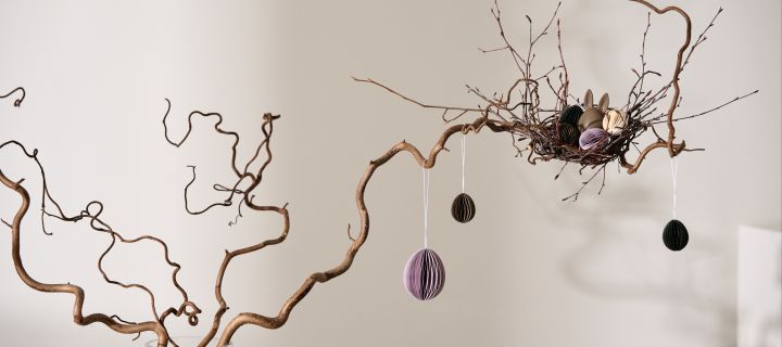 How to make an Easter tree - here you see the DBKD paper egg decorations hanging in the branches of a home made Easter tree. 