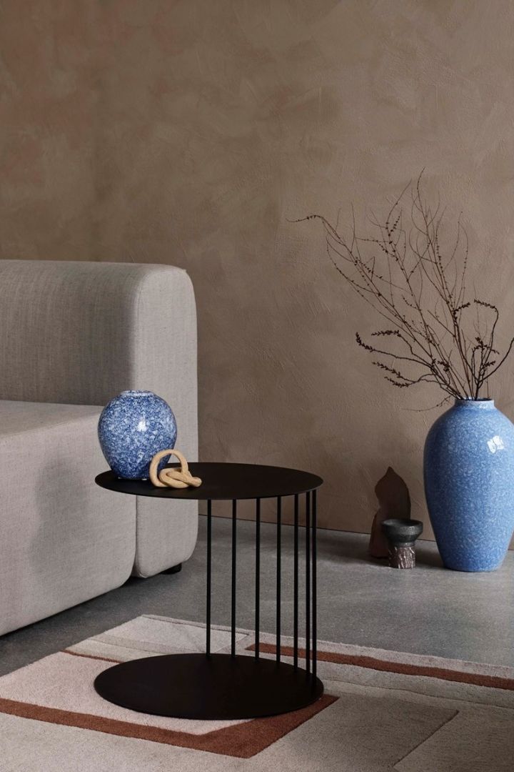 Blue will be trendy in interior design 2021 as shown here with blue ceramic vases from Broste Copenhagen.