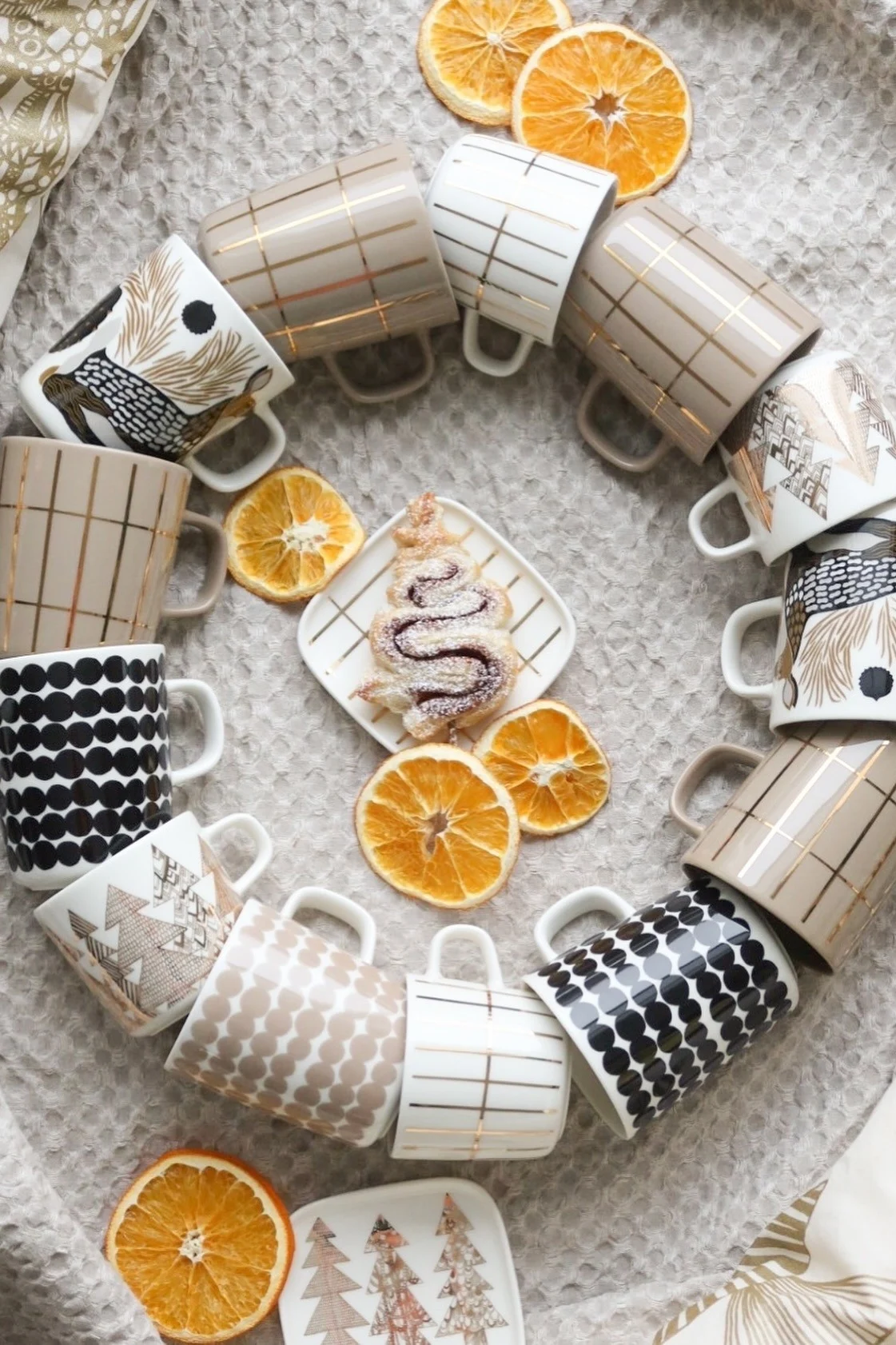 A selection of mugs from Marimekko arranged in a circle by @kotolampi.