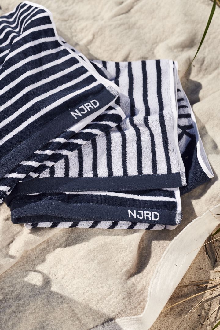A soft blue beach towel from NJRD is definitely a summer essential for on the beach.