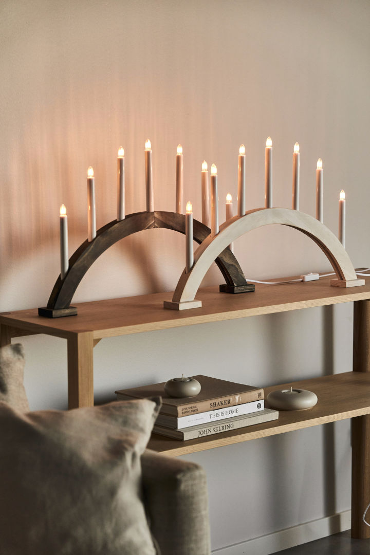 Stylish traditional Christmas candle bridges to light up your windowsill this Christmas. Here you see the Sky candle bridge from Scandi Living in light oak and walnut.  
