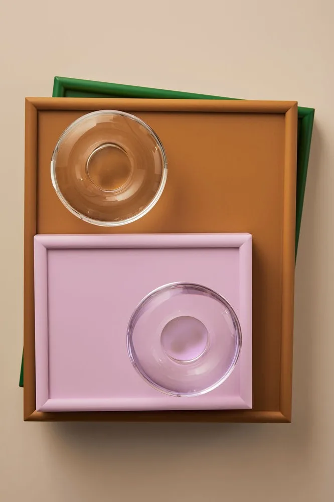 The Chateau white wine glasses from Kosta Boda on a set table with colourful HAY candlesticks on the table. 