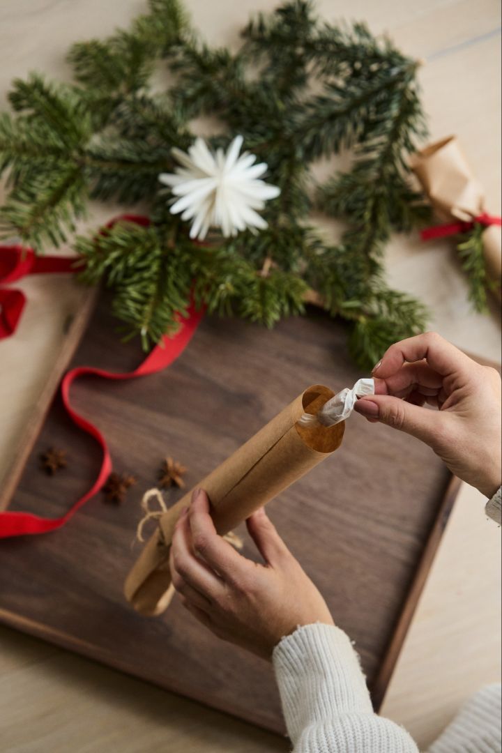 Make your own Christmas crackers with our free tutorial