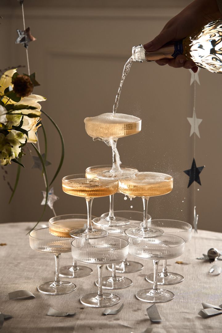 New year party ideas - here you see a champagne tower built from the Ripple champagne glasses from Ferm LIVING. 