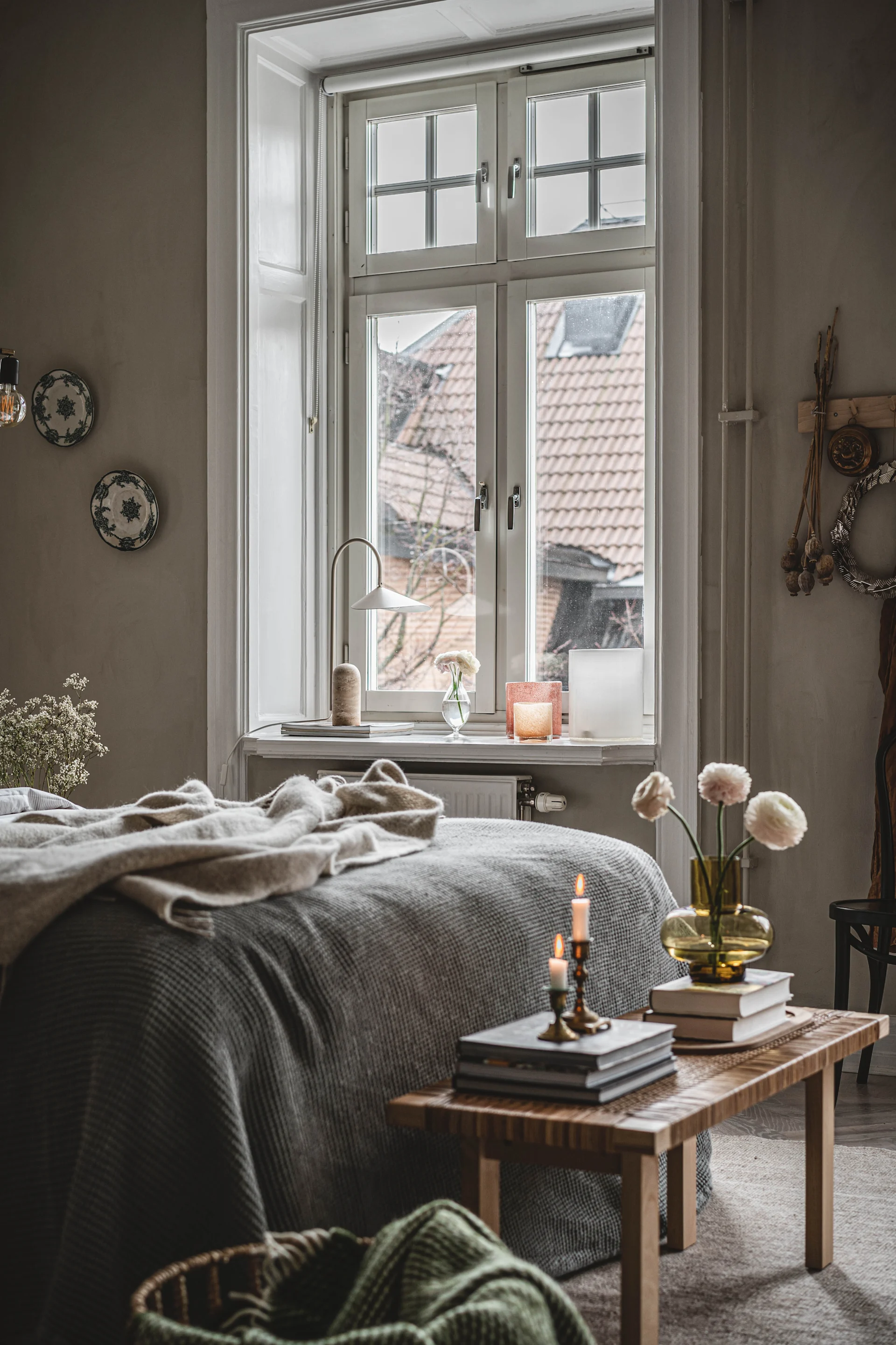 Create a cosy bedroom with a calming base colour to make the details really stand out.