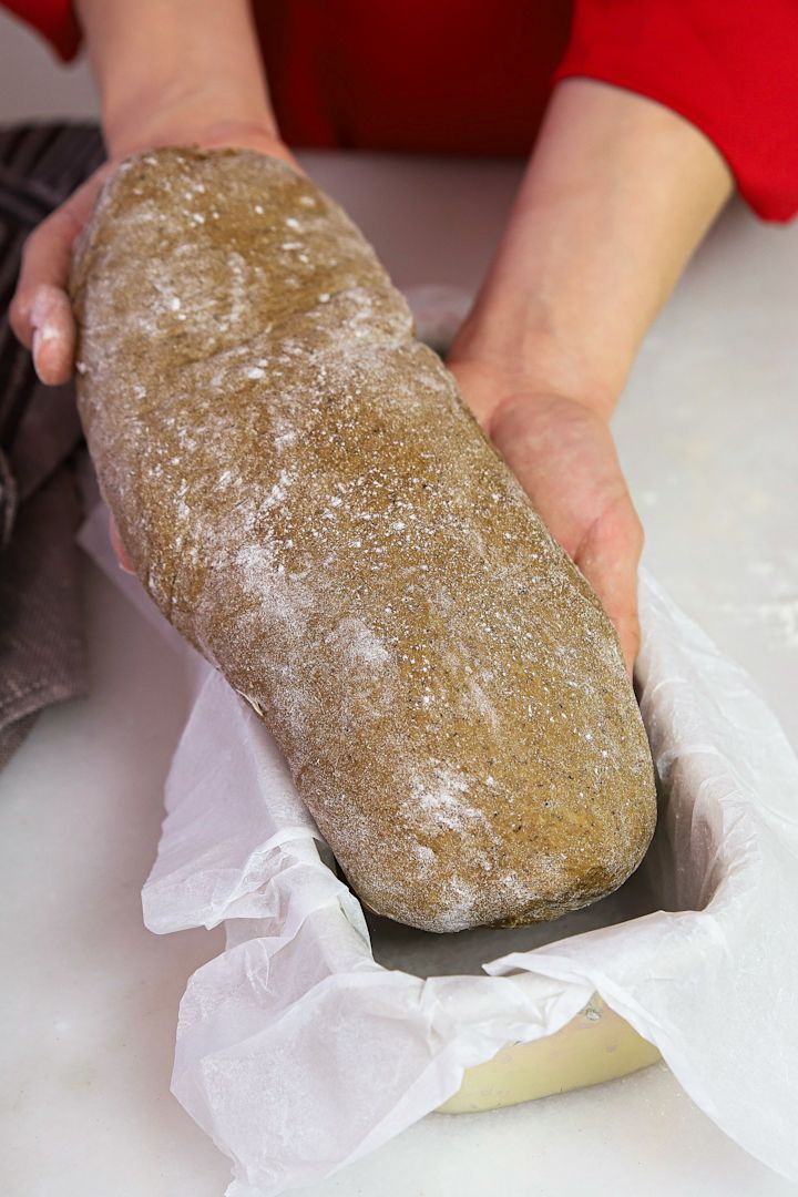 Christmas baking recipes from Baka med Frida - Frida places her Swedish wort bread in a narrow bread tin lined with baking paper. 