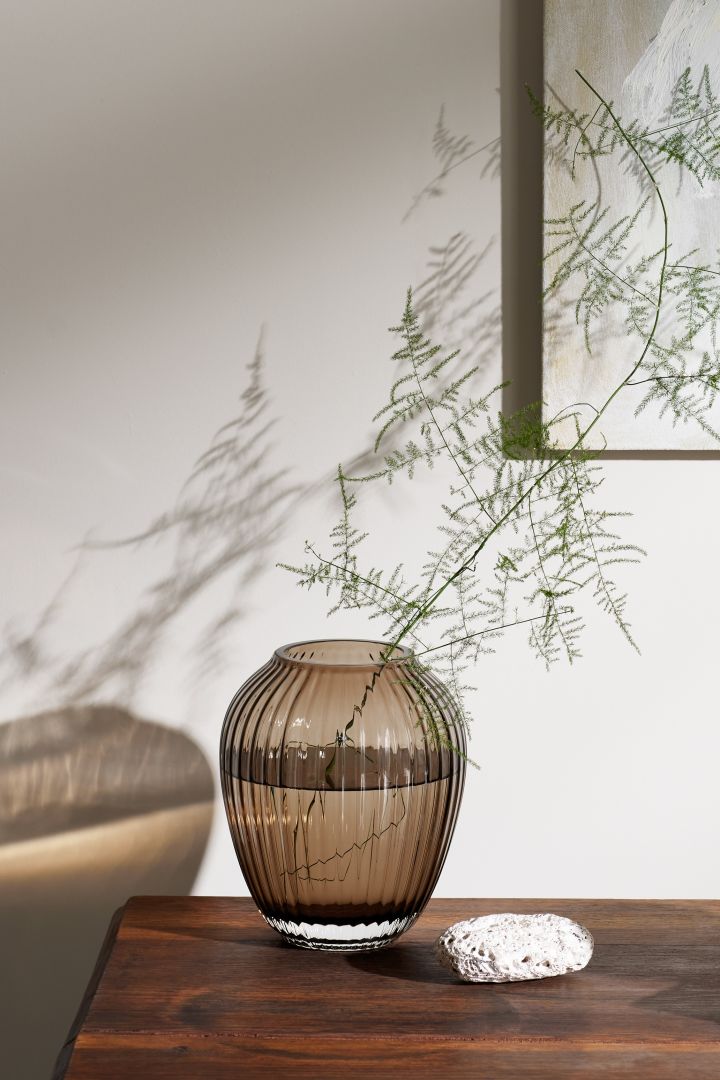 Fluted glass is one of this year's trends. The Hammershøi vase in a brown shade from Kähler looks beautiful placed in a window as the light catches the colours. 