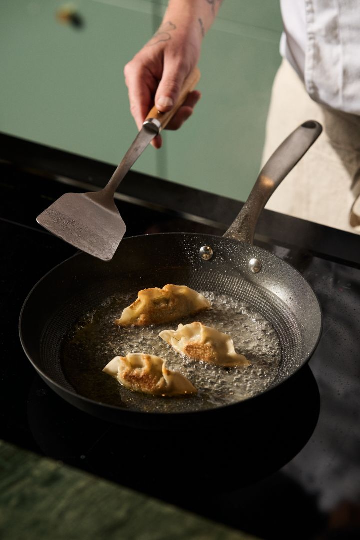 A good quality frying pan like the Satake pan you see here frying dumplings, makes a great Christmas gift idea. 