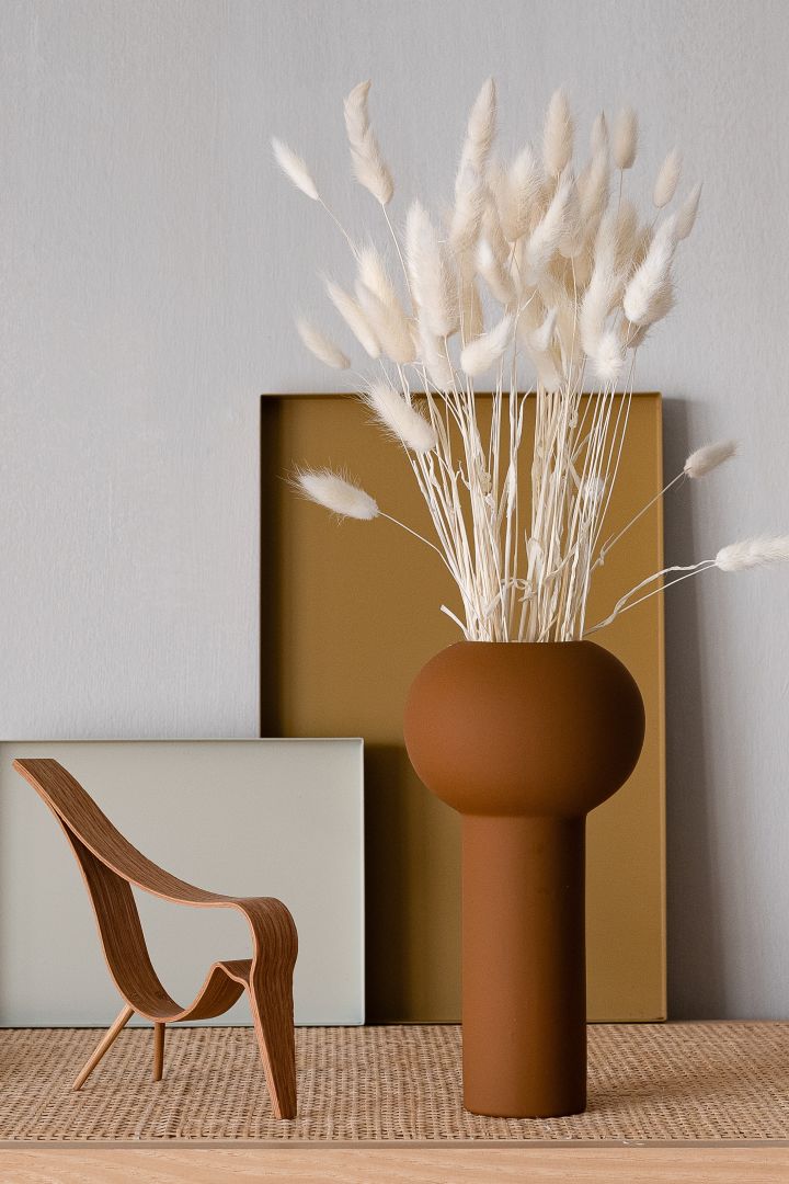 The tactile Cooee Design Pillar vase is the embodiment of round shapes meeting straight lines for one of the top interior design trends of 2021.